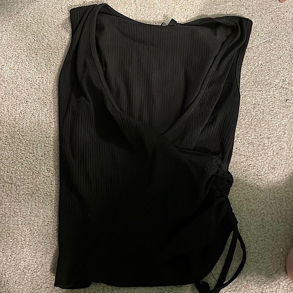 A black tank top never worn
